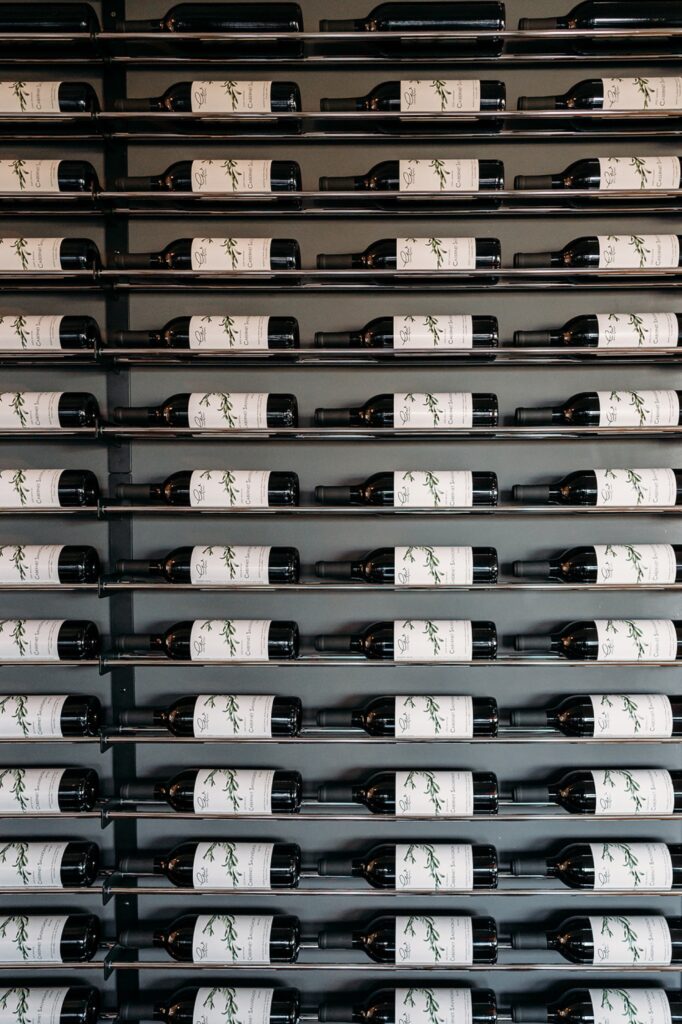 The Geneva Winery in Batavia Illinois displays their wine collection on the walls of the winery.